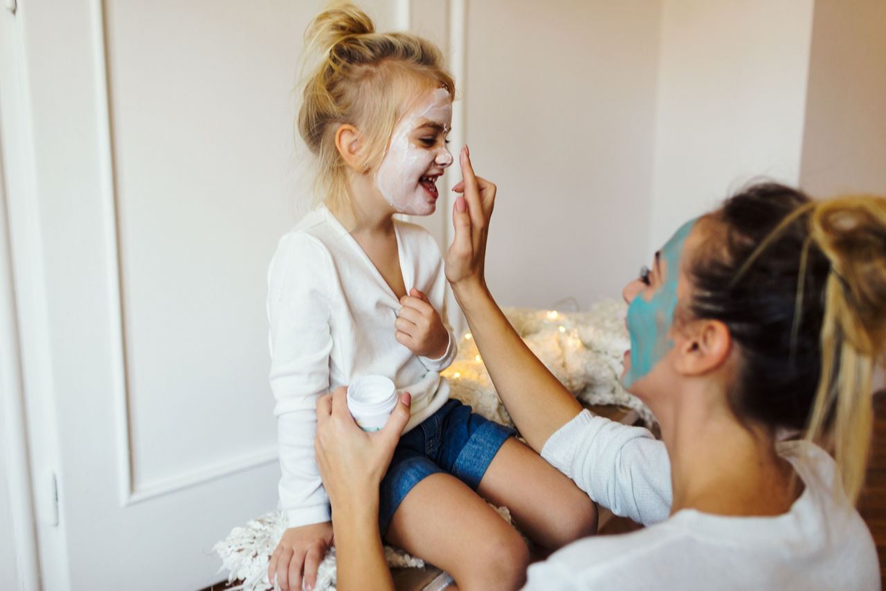 Mother and daughter having beauty time