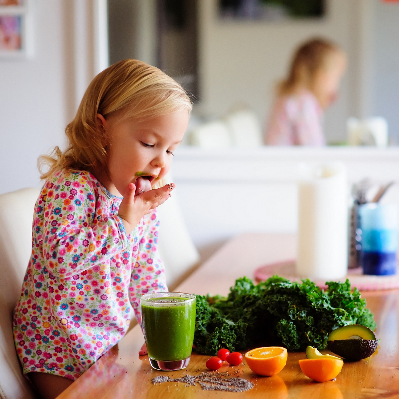 Toddler girl green smoothie