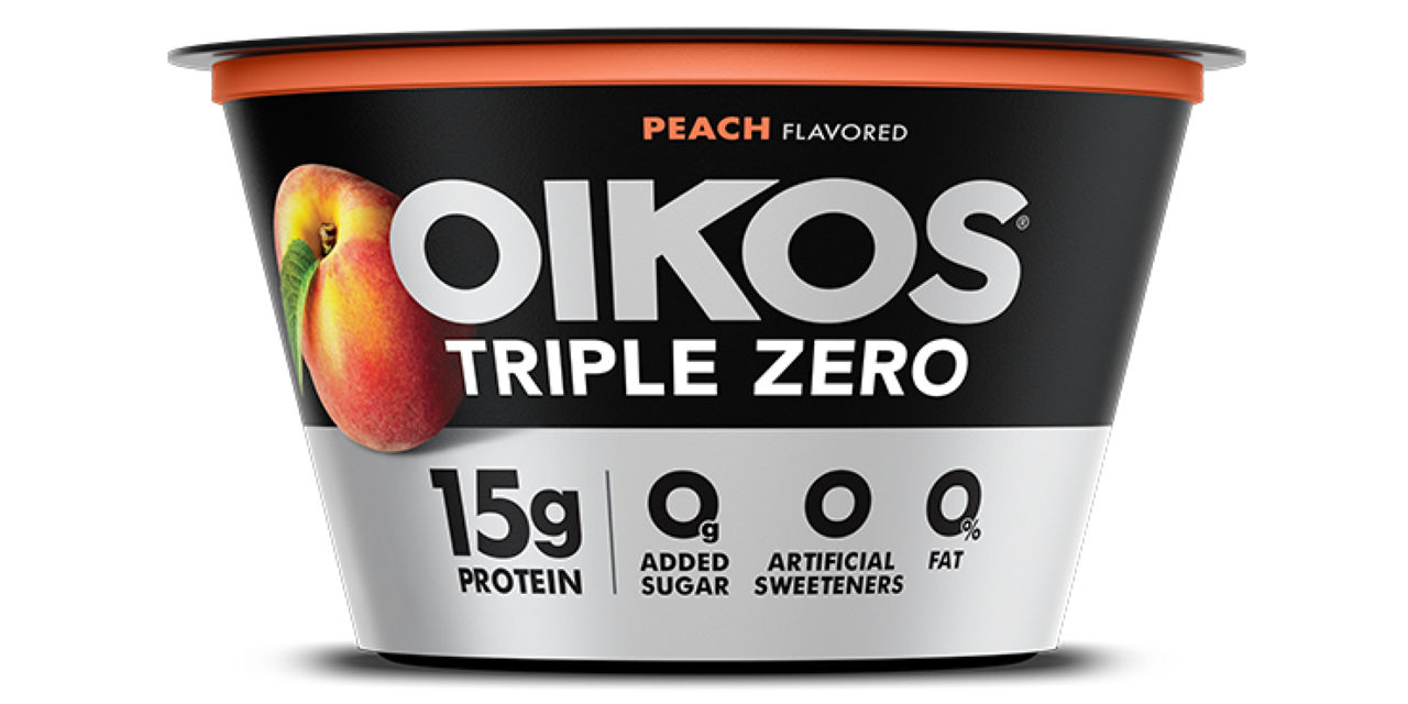 Front angle of Oikos Triple Zero Peach flavor cup