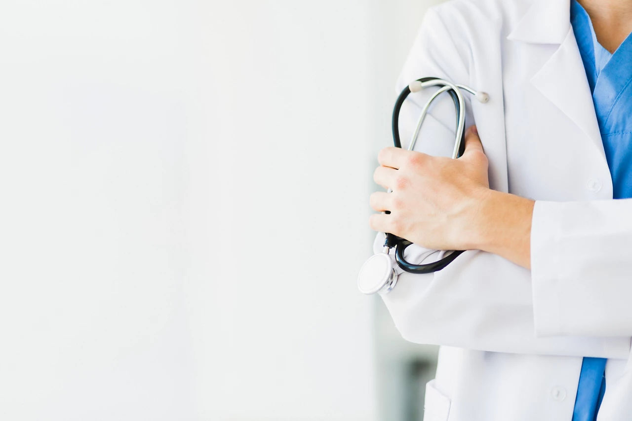 Doctor holding a stethoscope in his hands