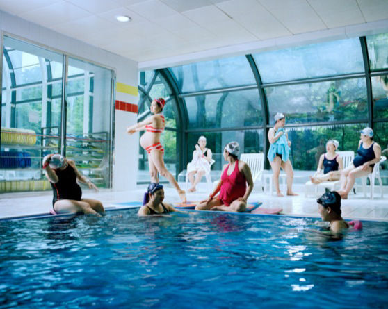 Pregnant women at indoor swimming pool