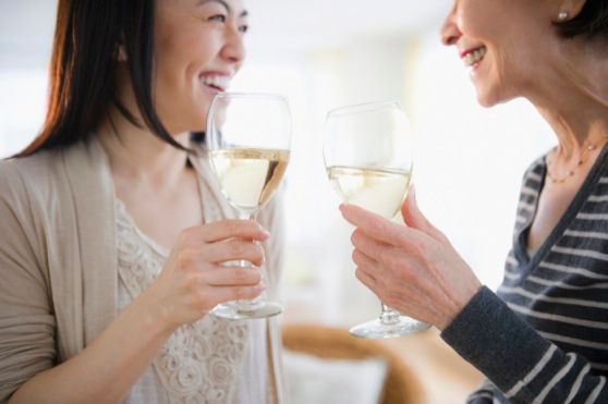 Japanese mother and daughter drinking white wine