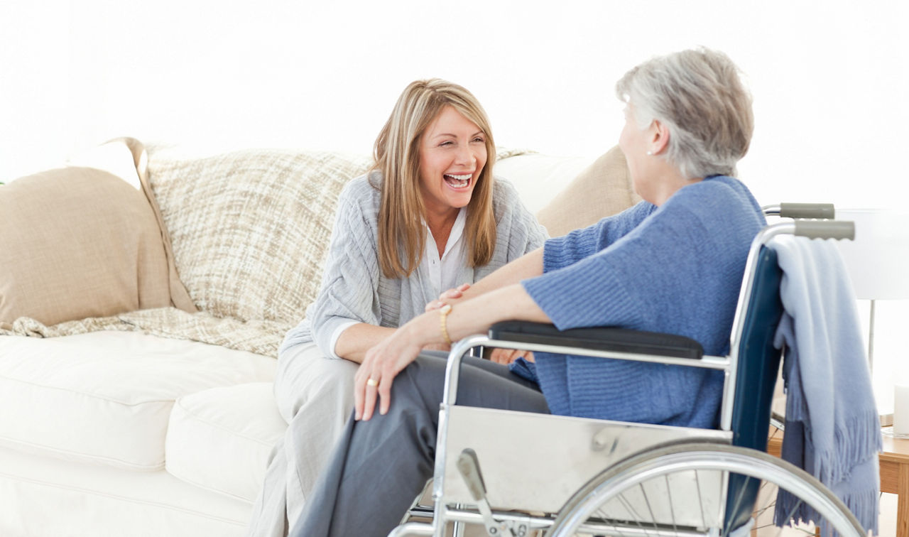 Seniors talking together in the livingroom