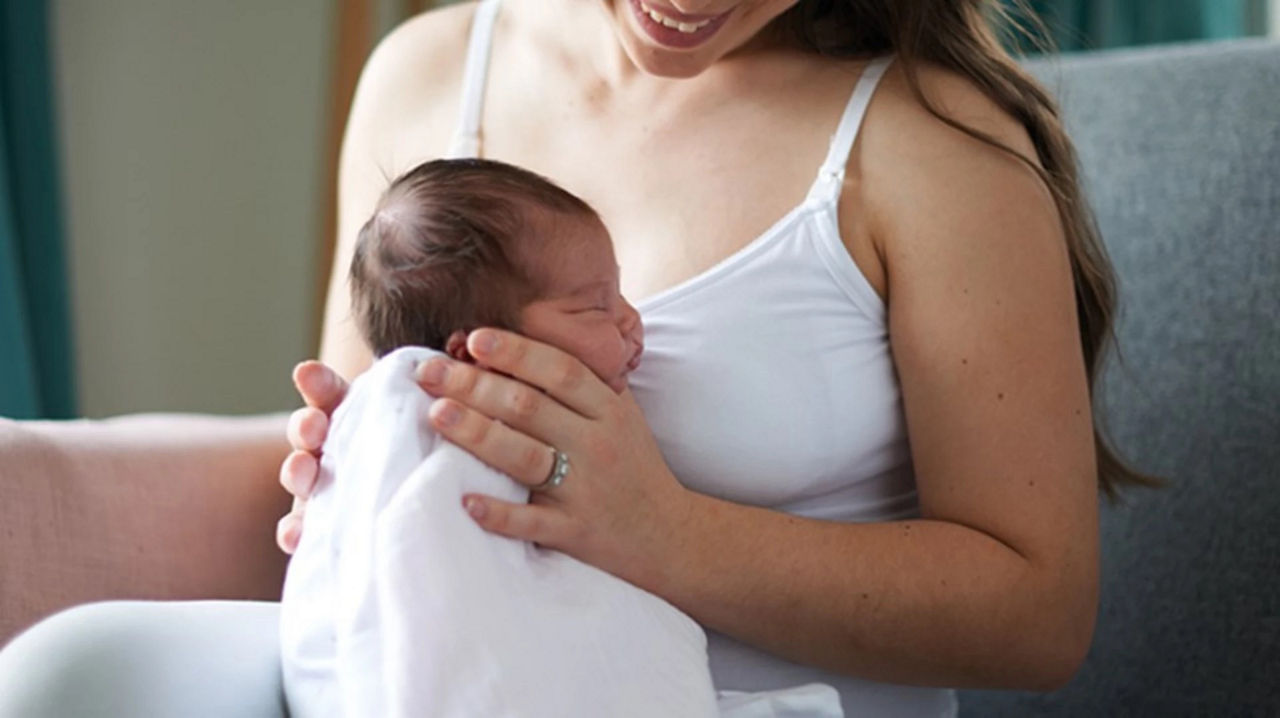 mom breastfeeding baby